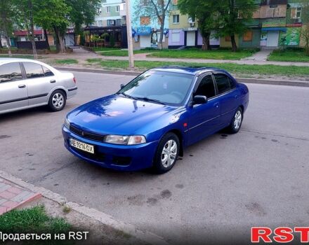 Синий Мицубиси Лансер, объемом двигателя 1.3 л и пробегом 270 тыс. км за 2100 $, фото 2 на Automoto.ua