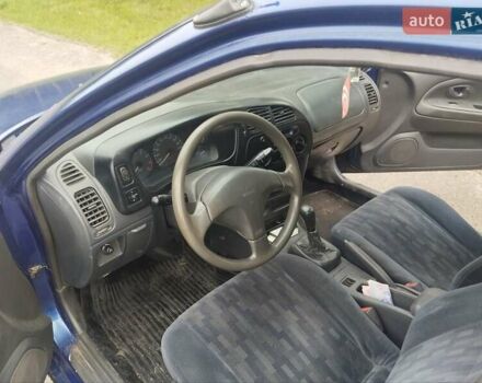 Синій Міцубісі Lancer, об'ємом двигуна 1.3 л та пробігом 300 тис. км за 980 $, фото 6 на Automoto.ua