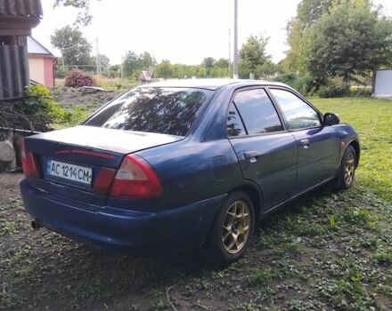 Синий Мицубиси Лансер, объемом двигателя 1.3 л и пробегом 3 тыс. км за 1399 $, фото 5 на Automoto.ua