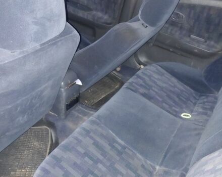 Синий Мицубиси Лансер, объемом двигателя 1.3 л и пробегом 270 тыс. км за 2100 $, фото 6 на Automoto.ua