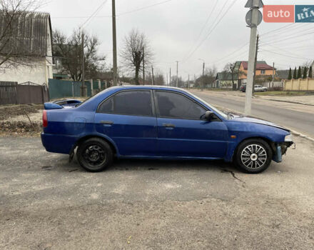 Синий Мицубиси Лансер, объемом двигателя 1.3 л и пробегом 250 тыс. км за 1000 $, фото 4 на Automoto.ua
