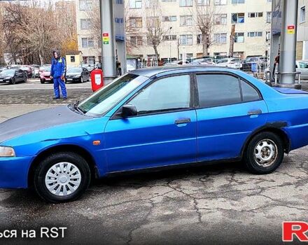 Синій Міцубісі Lancer, об'ємом двигуна 1.3 л та пробігом 180 тис. км за 1800 $, фото 4 на Automoto.ua