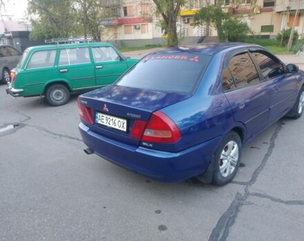 Синий Мицубиси Лансер, объемом двигателя 1.3 л и пробегом 270 тыс. км за 2100 $, фото 1 на Automoto.ua