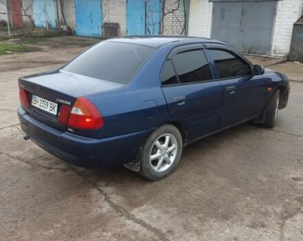 Синий Мицубиси Лансер, объемом двигателя 0 л и пробегом 240 тыс. км за 2300 $, фото 3 на Automoto.ua