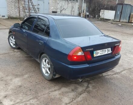 Синий Мицубиси Лансер, объемом двигателя 0 л и пробегом 240 тыс. км за 2300 $, фото 5 на Automoto.ua