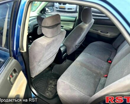 Синій Міцубісі Lancer, об'ємом двигуна 1.6 л та пробігом 220 тис. км за 3299 $, фото 8 на Automoto.ua