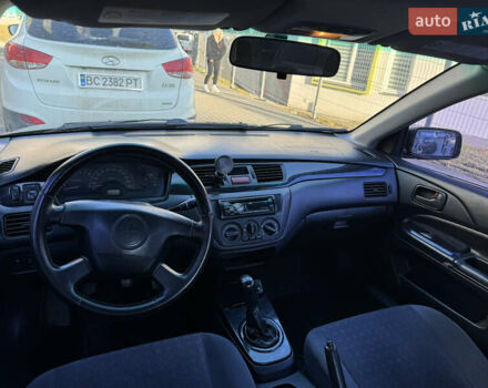 Синій Міцубісі Lancer, об'ємом двигуна 1.6 л та пробігом 400 тис. км за 2600 $, фото 12 на Automoto.ua