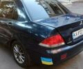 Синий Мицубиси Лансер, объемом двигателя 1.58 л и пробегом 411 тыс. км за 3000 $, фото 9 на Automoto.ua