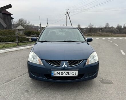 Синий Мицубиси Лансер, объемом двигателя 1.6 л и пробегом 182 тыс. км за 3500 $, фото 7 на Automoto.ua