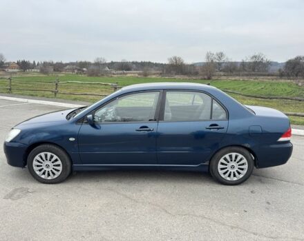 Синий Мицубиси Лансер, объемом двигателя 1.6 л и пробегом 182 тыс. км за 3500 $, фото 1 на Automoto.ua