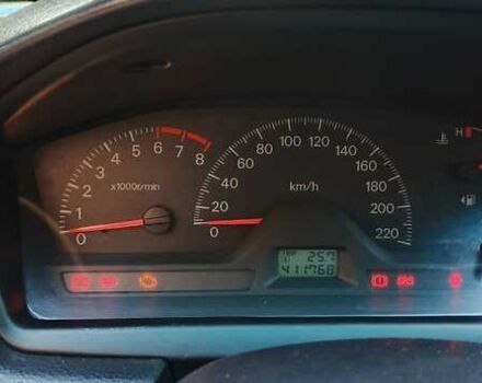 Синий Мицубиси Лансер, объемом двигателя 1.58 л и пробегом 411 тыс. км за 3000 $, фото 1 на Automoto.ua