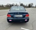 Синий Мицубиси Лансер, объемом двигателя 1.6 л и пробегом 182 тыс. км за 3500 $, фото 3 на Automoto.ua