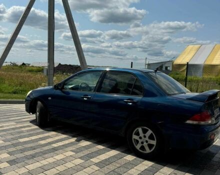 Мицубиси Лансер 2003 в Львове на Automoto.ua Синий Мицубиси Лансер, объемом двигателя 1.6 л и пробегом 400 тыс. км за 2500 $, фото 2 на Automoto.ua