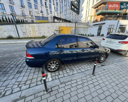 Синій Міцубісі Lancer, об'ємом двигуна 1.6 л та пробігом 400 тис. км за 2600 $, фото 6 на Automoto.ua