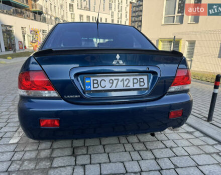 Синій Міцубісі Lancer, об'ємом двигуна 1.6 л та пробігом 400 тис. км за 2600 $, фото 4 на Automoto.ua