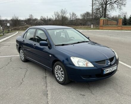 Синий Мицубиси Лансер, объемом двигателя 1.6 л и пробегом 182 тыс. км за 3500 $, фото 6 на Automoto.ua