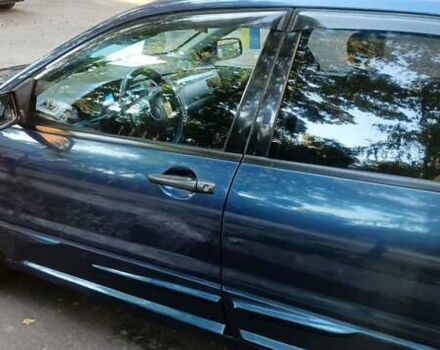 Синий Мицубиси Лансер, объемом двигателя 1.58 л и пробегом 411 тыс. км за 3000 $, фото 6 на Automoto.ua