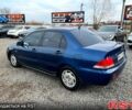 Синій Міцубісі Lancer, об'ємом двигуна 1.6 л та пробігом 220 тис. км за 3299 $, фото 3 на Automoto.ua