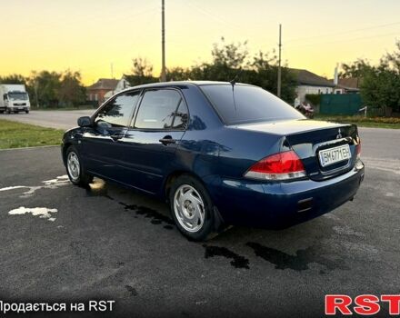 Синій Міцубісі Lancer, об'ємом двигуна 1.6 л та пробігом 150 тис. км за 3250 $, фото 2 на Automoto.ua