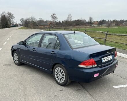 Синий Мицубиси Лансер, объемом двигателя 1.6 л и пробегом 182 тыс. км за 3500 $, фото 2 на Automoto.ua