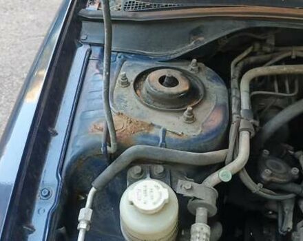 Синий Мицубиси Лансер, объемом двигателя 1.58 л и пробегом 411 тыс. км за 3000 $, фото 3 на Automoto.ua