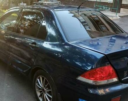 Синий Мицубиси Лансер, объемом двигателя 1.58 л и пробегом 411 тыс. км за 3000 $, фото 8 на Automoto.ua