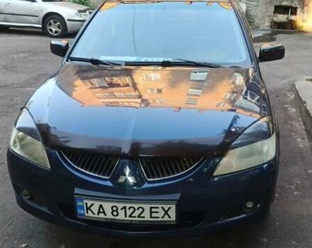 Синий Мицубиси Лансер, объемом двигателя 1.58 л и пробегом 411 тыс. км за 3000 $, фото 13 на Automoto.ua