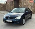 Синій Міцубісі Lancer, об'ємом двигуна 1.58 л та пробігом 299 тис. км за 3999 $, фото 1 на Automoto.ua