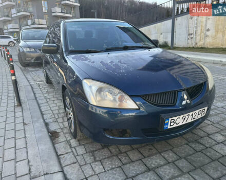 Синій Міцубісі Lancer, об'ємом двигуна 1.6 л та пробігом 400 тис. км за 2600 $, фото 8 на Automoto.ua