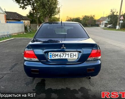 Синій Міцубісі Lancer, об'ємом двигуна 1.6 л та пробігом 150 тис. км за 3250 $, фото 3 на Automoto.ua