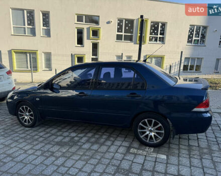 Синій Міцубісі Lancer, об'ємом двигуна 1.6 л та пробігом 400 тис. км за 2600 $, фото 2 на Automoto.ua