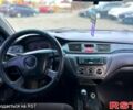 Синій Міцубісі Lancer, об'ємом двигуна 1.6 л та пробігом 220 тис. км за 3299 $, фото 10 на Automoto.ua
