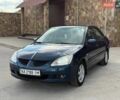 Синій Міцубісі Lancer, об'ємом двигуна 1.58 л та пробігом 299 тис. км за 3799 $, фото 1 на Automoto.ua