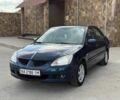 Синий Мицубиси Лансер, объемом двигателя 1.6 л и пробегом 299 тыс. км за 3999 $, фото 1 на Automoto.ua