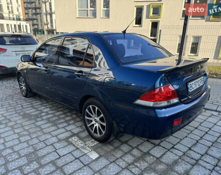 Синій Міцубісі Lancer, об'ємом двигуна 1.6 л та пробігом 400 тис. км за 2600 $, фото 3 на Automoto.ua