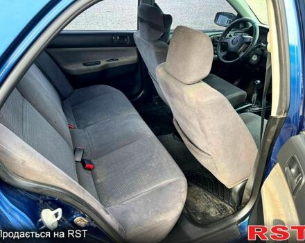 Синій Міцубісі Lancer, об'ємом двигуна 1.6 л та пробігом 220 тис. км за 3299 $, фото 7 на Automoto.ua