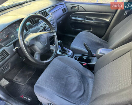 Синій Міцубісі Lancer, об'ємом двигуна 1.6 л та пробігом 400 тис. км за 2600 $, фото 10 на Automoto.ua