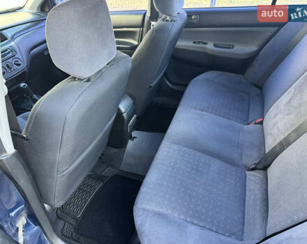 Синій Міцубісі Lancer, об'ємом двигуна 1.6 л та пробігом 400 тис. км за 2600 $, фото 13 на Automoto.ua
