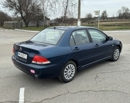 Синий Мицубиси Лансер, объемом двигателя 1.6 л и пробегом 182 тыс. км за 3500 $, фото 4 на Automoto.ua