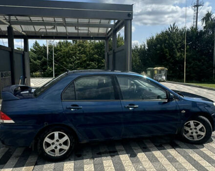 Мицубиси Лансер 2003 в Львове на Automoto.ua Синий Мицубиси Лансер, объемом двигателя 1.58 л и пробегом 400 тыс. км за 2500 $, фото 3 на Automoto.ua