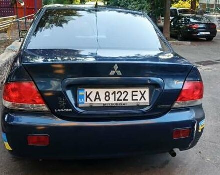 Синий Мицубиси Лансер, объемом двигателя 1.58 л и пробегом 411 тыс. км за 3000 $, фото 12 на Automoto.ua