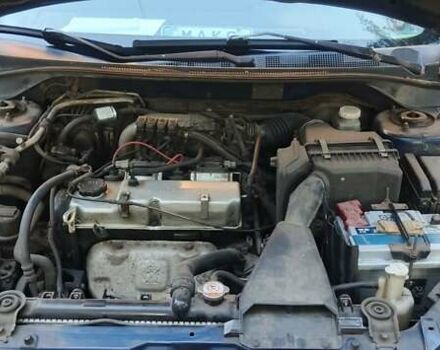 Синий Мицубиси Лансер, объемом двигателя 1.58 л и пробегом 411 тыс. км за 3000 $, фото 4 на Automoto.ua