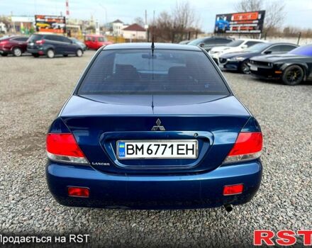Синій Міцубісі Lancer, об'ємом двигуна 1.6 л та пробігом 220 тис. км за 3299 $, фото 2 на Automoto.ua