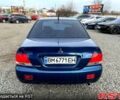Синій Міцубісі Lancer, об'ємом двигуна 1.6 л та пробігом 220 тис. км за 3299 $, фото 2 на Automoto.ua