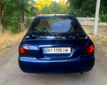 Синий Мицубиси Лансер, объемом двигателя 1.6 л и пробегом 295 тыс. км за 4550 $, фото 6 на Automoto.ua