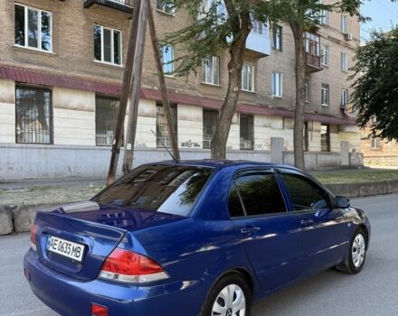 Синій Міцубісі Lancer, об'ємом двигуна 1.3 л та пробігом 198 тис. км за 3750 $, фото 4 на Automoto.ua