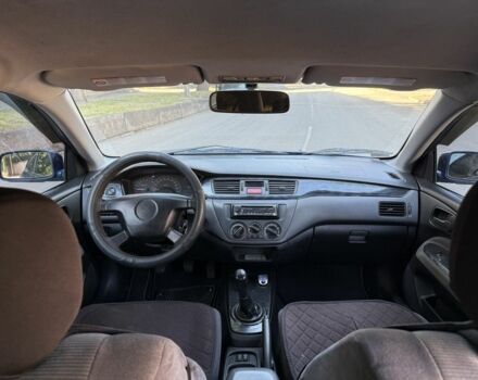 Синій Міцубісі Lancer, об'ємом двигуна 1.3 л та пробігом 198 тис. км за 3750 $, фото 12 на Automoto.ua