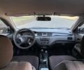 Синій Міцубісі Lancer, об'ємом двигуна 1.3 л та пробігом 198 тис. км за 3750 $, фото 12 на Automoto.ua