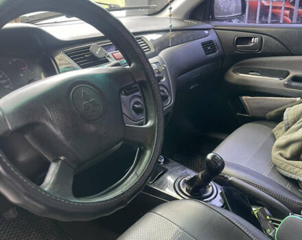 Синий Мицубиси Лансер, объемом двигателя 1.58 л и пробегом 234 тыс. км за 3500 $, фото 12 на Automoto.ua