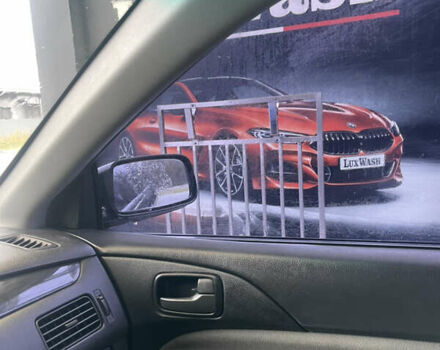 Синий Мицубиси Лансер, объемом двигателя 1.58 л и пробегом 234 тыс. км за 3500 $, фото 22 на Automoto.ua